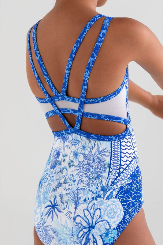 Back view of a blue floral leotard showcasing intricate straps and a stylish cutout design.