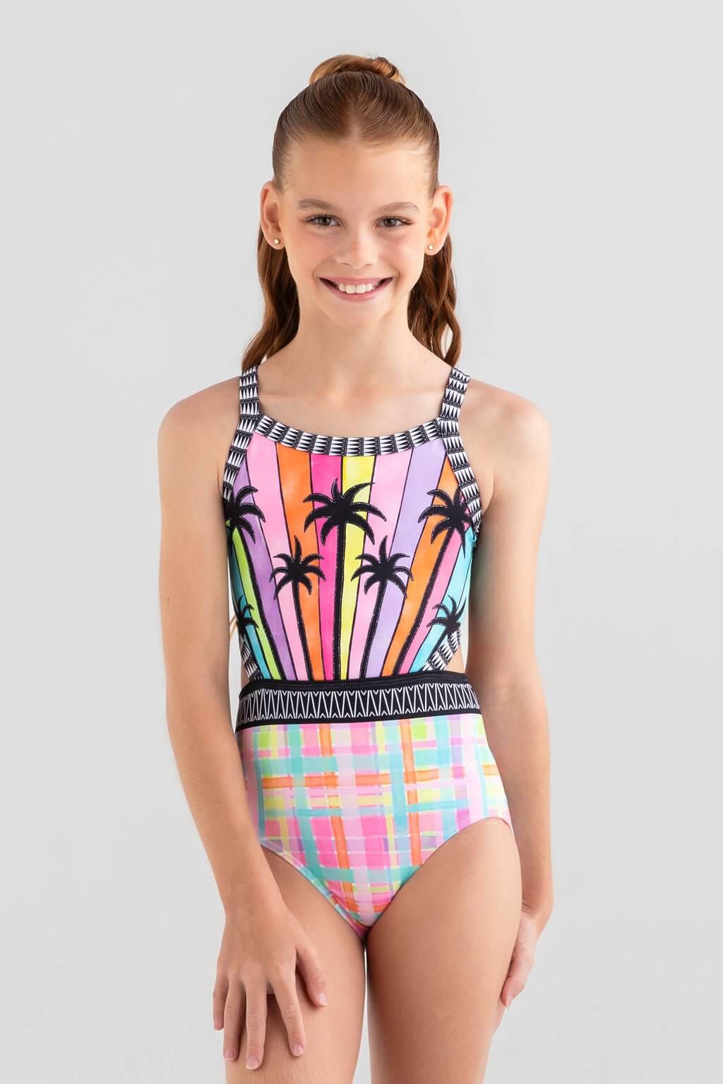 Colorful Mademoiselle Leotard with palm tree print and geometric patterns, perfect for summer fun.